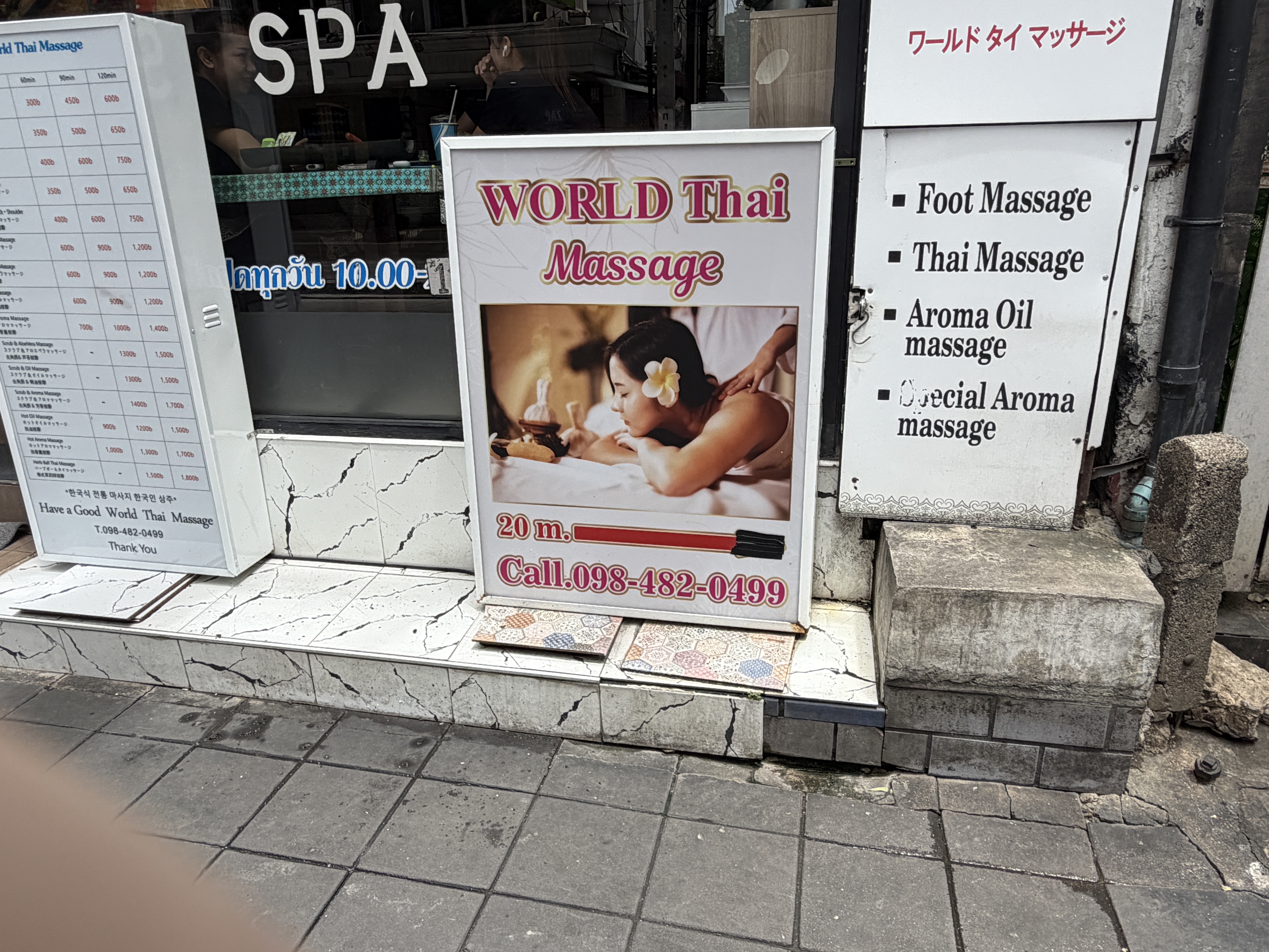 World Thai Massage on Sukhumvit Soi 39 Bangkok - outdoor massage menu signs
